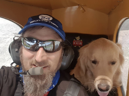 Robby Clemens with pilot and dog